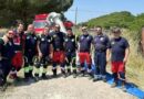 Francesco Mastroianni, il quarto a destra assieme ad un gruppo di volontari